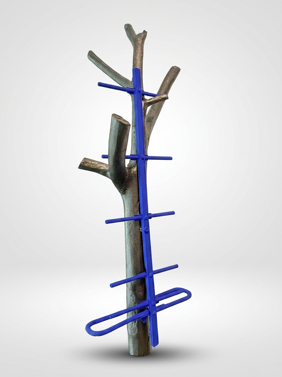 Blue metal sculpture on a white background