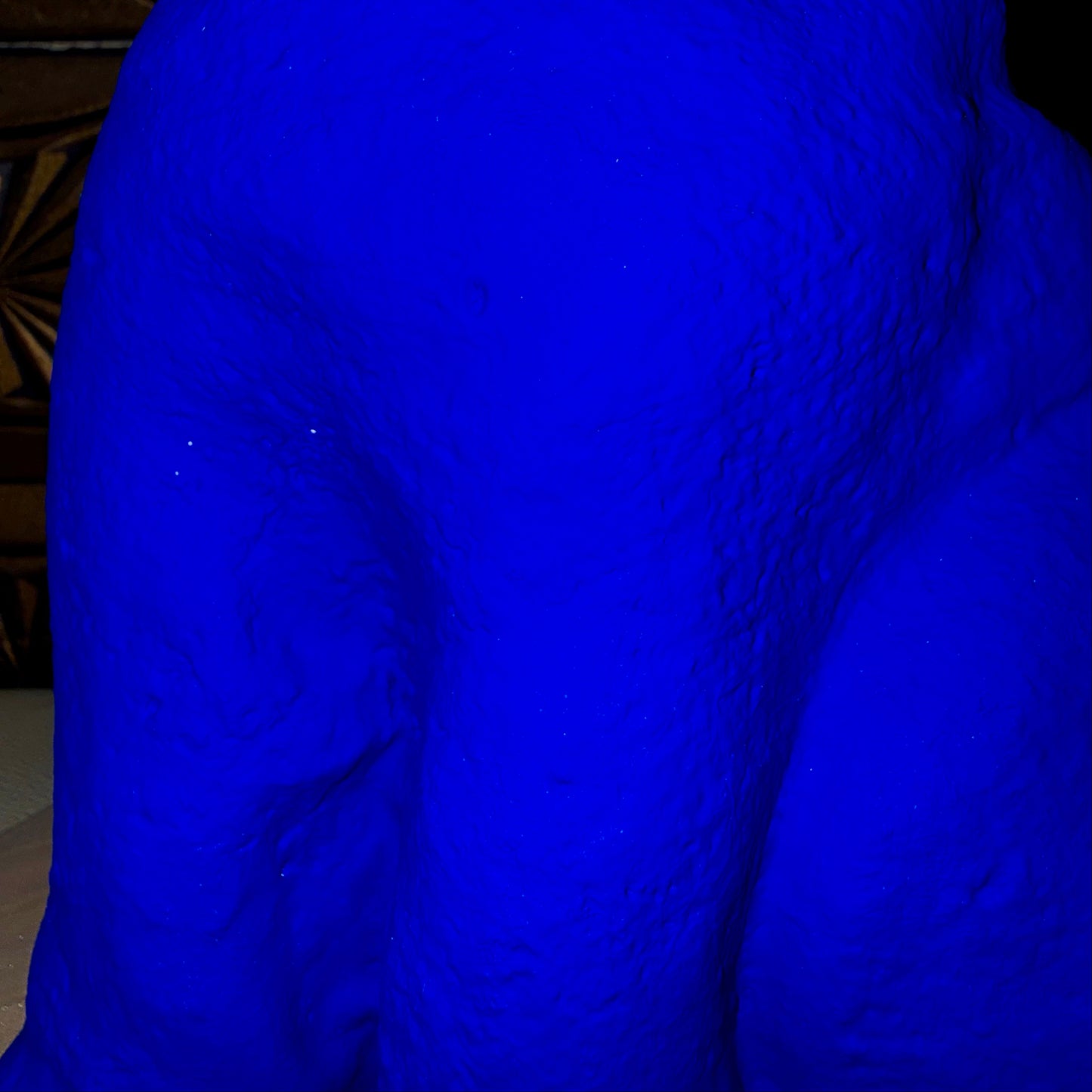 Close-up of a textured blue fabric surface