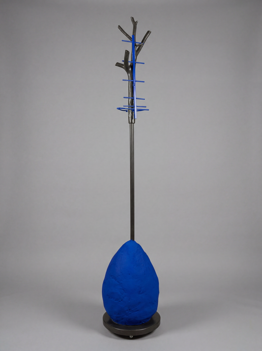 Blue coat stand with tree-like design on a gray background