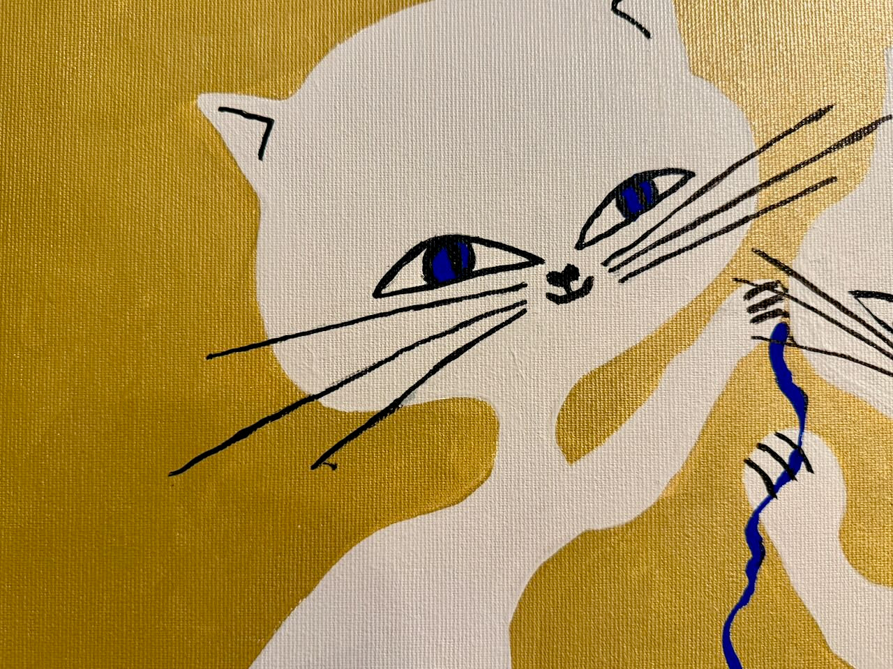 Illustration of a cat playing with a yarn ball on a gold background